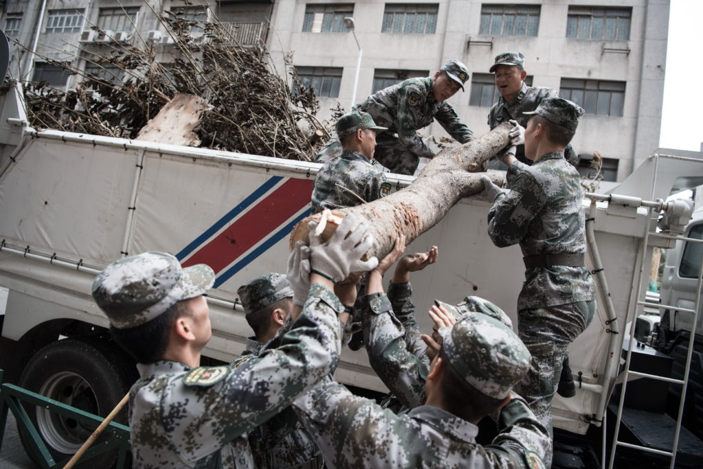 PLA soldiers work around clock to clean up Macao streets