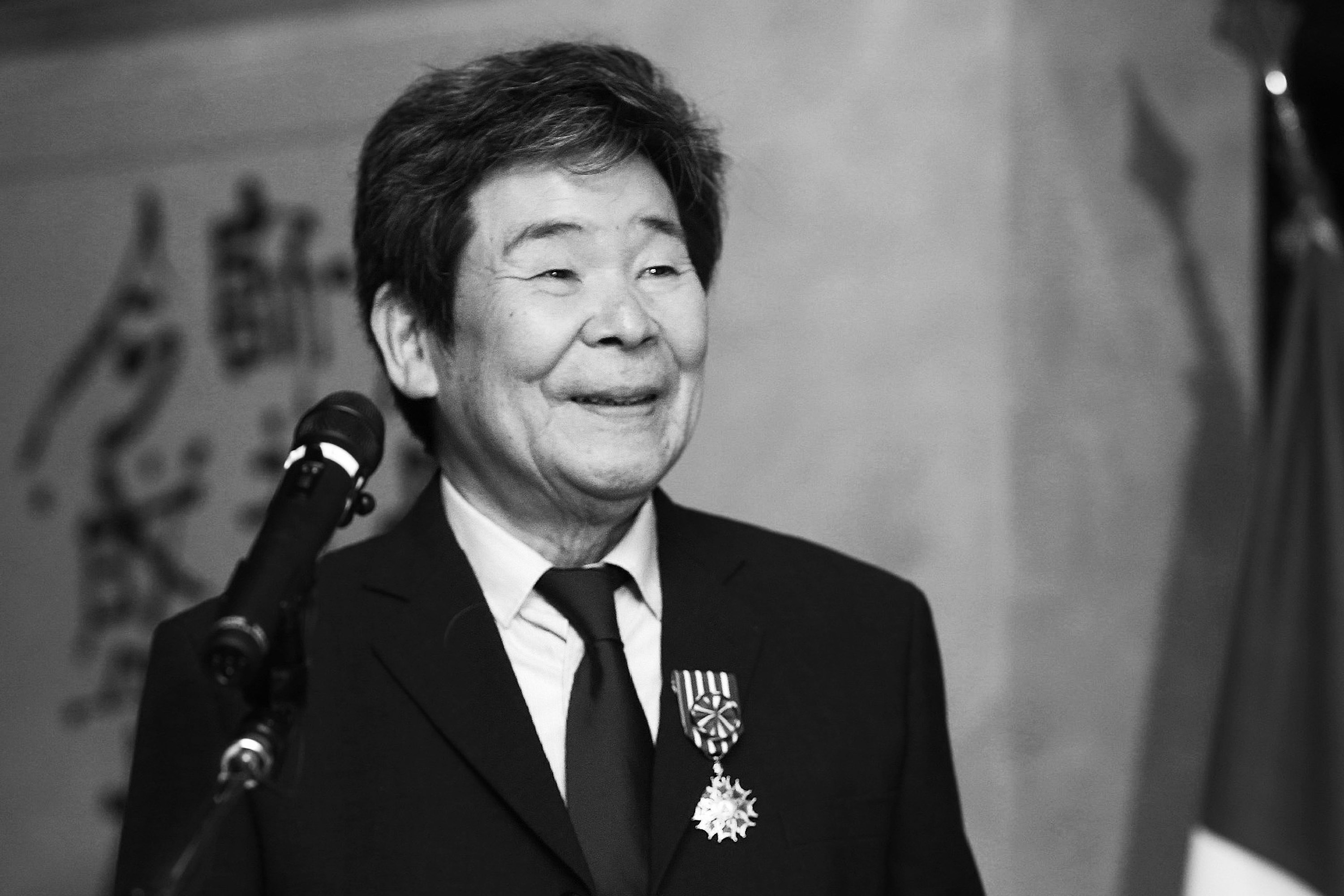 (FILES) This file picture taken on April 7, 2015 shows Japanese animation movie director Isao Takahata smiling as he received the "Officier of L'Ordre des Arts et des Letters" from the French ambassador to Japan at the French embassy in Tokyo. Oscar-nominated Japanese anime director Isao Takahata, who co-founded the Studio Ghibli and was best known for his work "Grave of the Fireflies", has died aged 82, the studio said on April 6, 2018. / AFP PHOTO / JIJI PRESS / JIJI PRESS / - Japan OUT