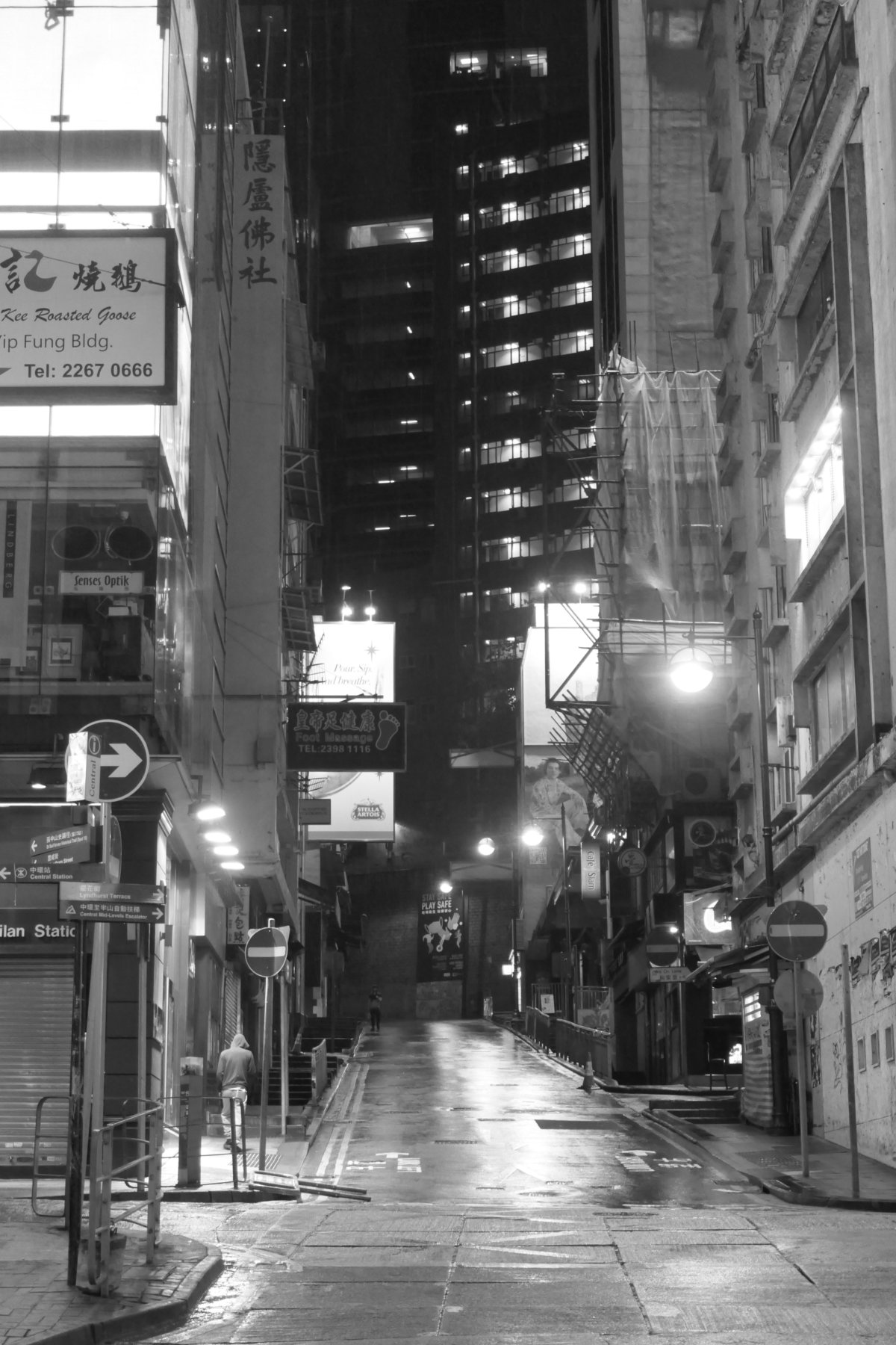 Sunday, 5 April 2020 would have been the end of the scheduled Hong Kong Rugby 7's weekend, and Lan Kwai Fong would have been heaving with thousands of people. This year, Central streets were deserted due to the imposition of social isolation measures and cancellation of public events. (circa 10.30pm, d'Aguilar Street, Central, Hong Kong, 5 April 2020. Photo: John Batten)