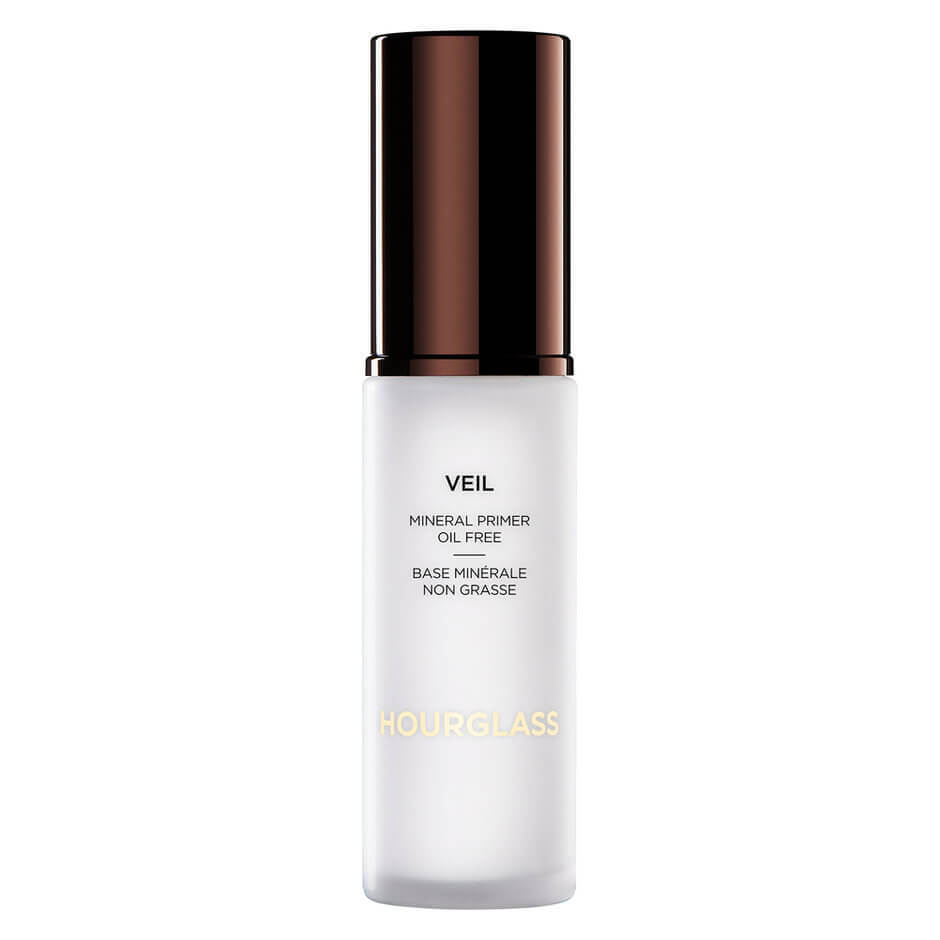 HOURGLASS Veil Mineral Primer 柔紗礦物質妝前乳 SPF15 HK$590/30ml 多用途底霜，質感柔滑，可同時降紅、柔化毛孔、撫平細紋。輕盈質地不會對妝容造成負擔。無油、防水配方，同時能帶來淨透、有光澤的膚色，讓妝容更清爽，並且長時間不脫妝。