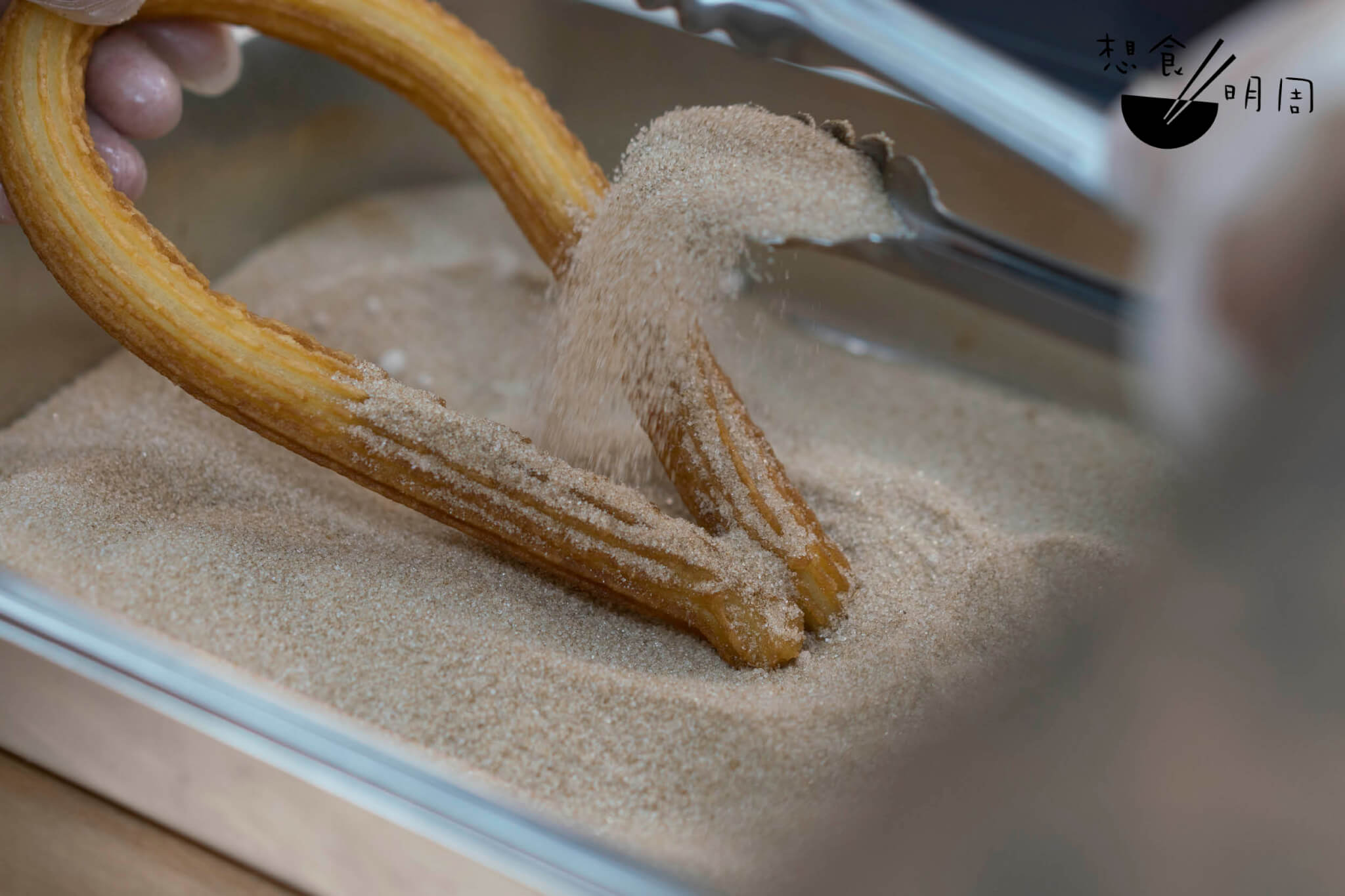 三分之一的churros會蘸上肉桂糖，保留傳統西班牙風味。