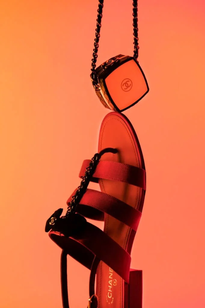 Chanel Black Lambskin Clutch with Chain  $21,400 Dark Pink Grosgrain Sandals $8,500 