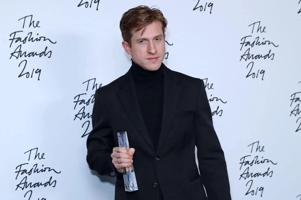 Bottega Veneta Creative director Daniel Lee poses after the company won the Brand of the Year award, following their award presentation at The Fashion Awards 2019 in London on December 2, 2019. - The Fashion Awards are an annual celebration of creativity and innovation will shine a spotlight on exceptional individuals and influential businesses that have made significant contributions to the global fashion industry over the past twelve months. (Photo by ISABEL INFANTES / AFP) / RESTRICTED TO EDITORIAL USE -  NO MARKETING NO ADVERTISING CAMPAIGNS (Photo by ISABEL INFANTES/AFP via Getty Images)