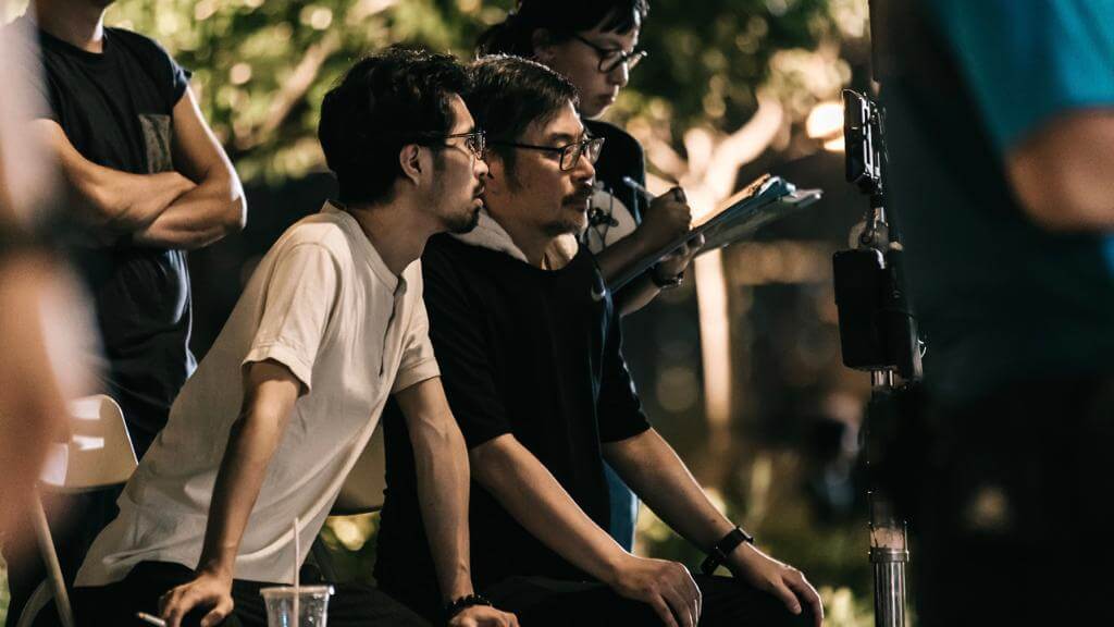 陳偉斌（左）與師父韋家輝（右）在《神探大戰》的拍攝現場（圖片由受訪者提供）