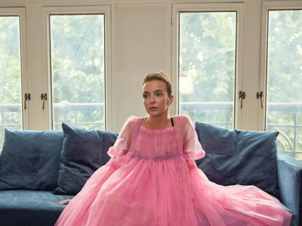 《獨行殺姬》最具標誌性的時尚時刻，就是粉色薄紗 Molly Goddard 連衣裙。