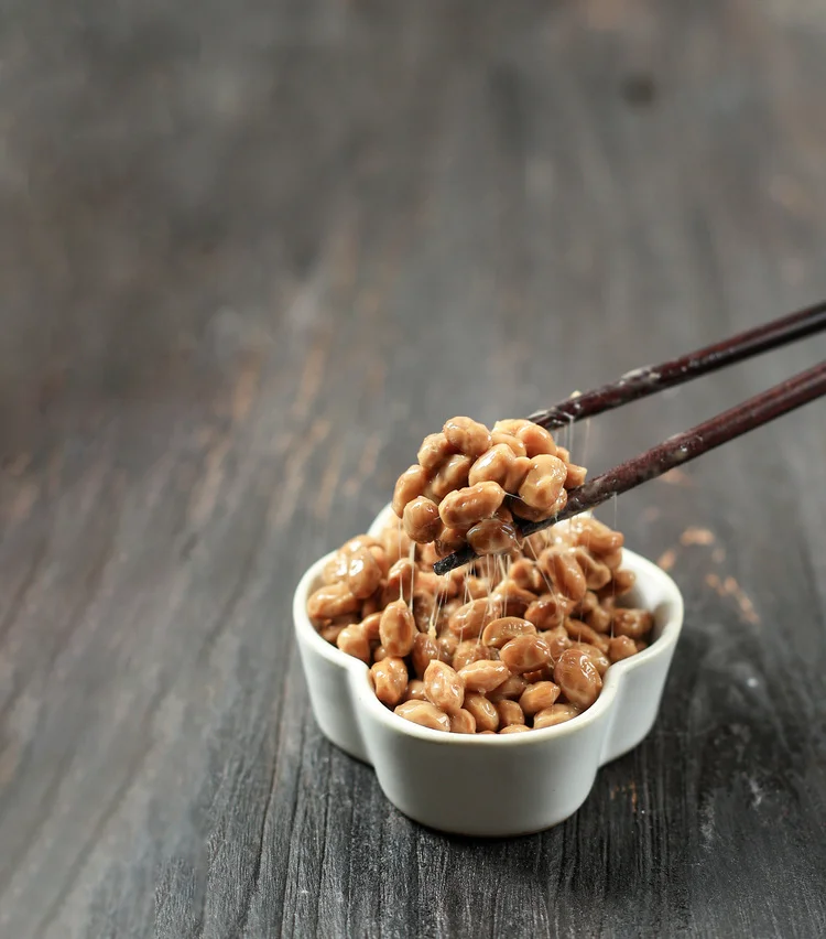 natto-lifted-with-chopstick-natto-is-japanese-fermented-sticky-soy-beans-with-stinky-smell_n