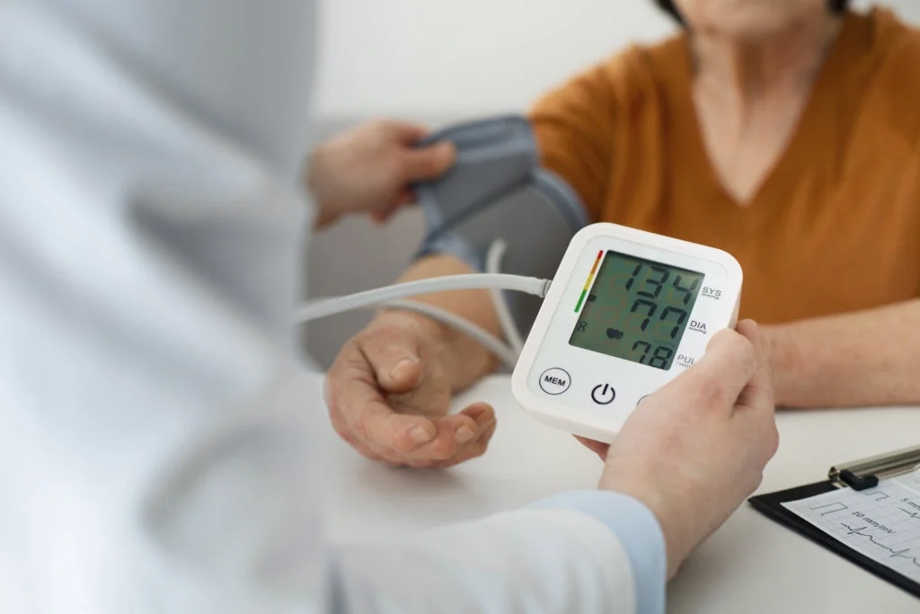 older-person-checking-their-blood-pressure-with-tensiometer