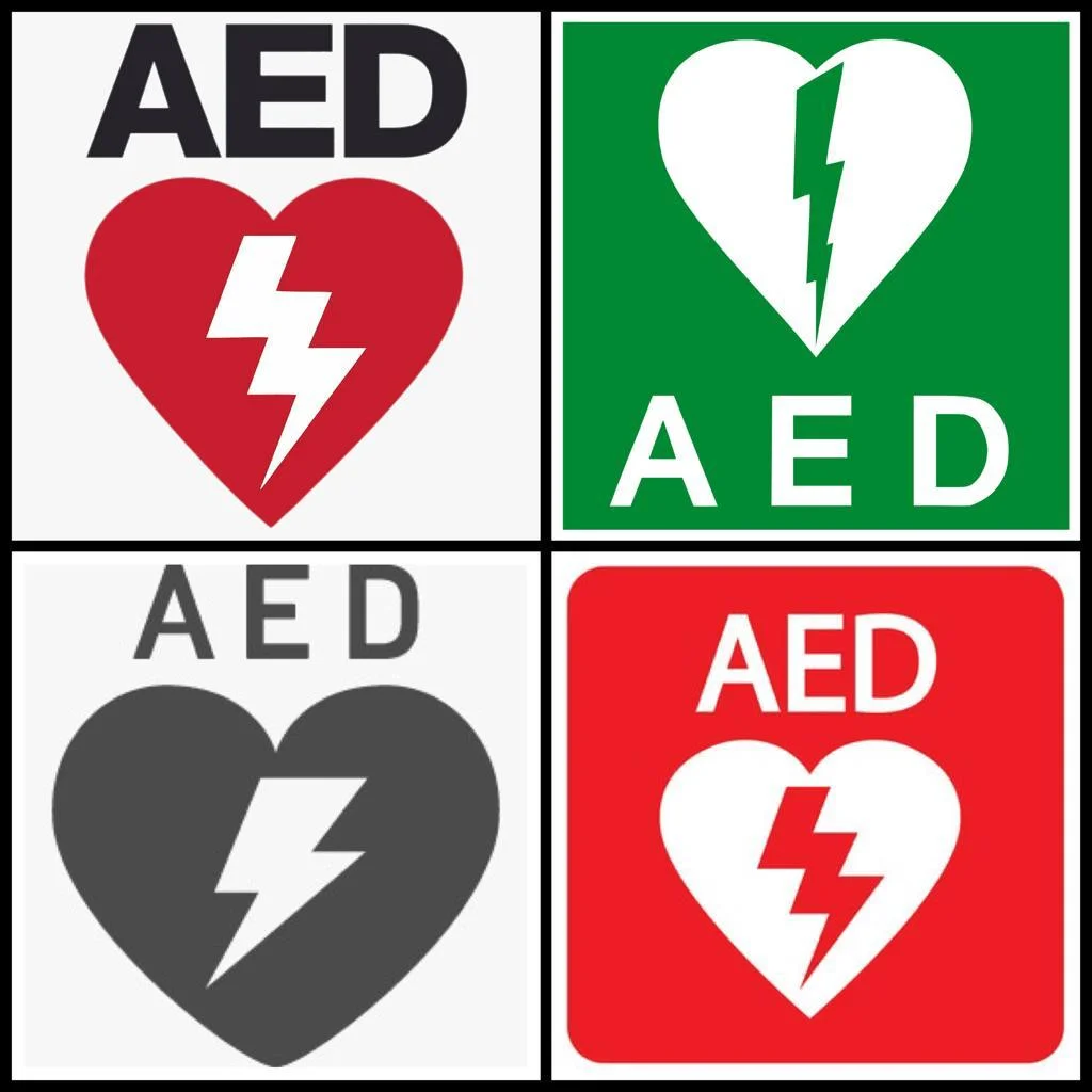 清晰的AED標誌應包括「心」、「雷電」及「AED」字樣（圖為部分例子）。