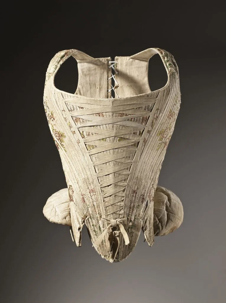 1200px-womans_corset_figured_silk_1730-1740