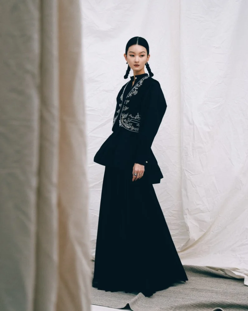 DOUBLE FACE VEST IN EMBROIDERED KID MOHAIR AND WOOL SKIRT IN BLACK COTTON AND SILK BLOUSE IN BLACK COTTON DIOR TRIBALES EARRINGS PAPILLON DE NUIT RING DIOR MÉTAMORPHOSE RING 