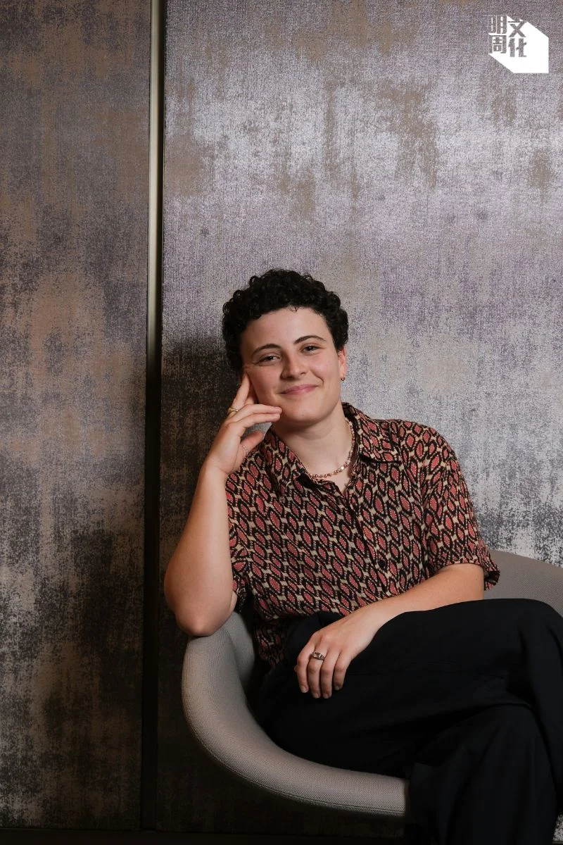 初次見面,Aud一頭清爽短捲髮,笑容溫暖。