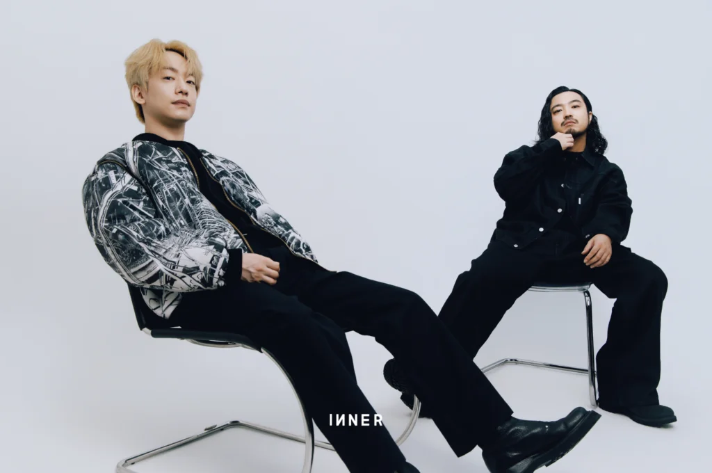 ON R-SHITEI: COAT, PANTS, COOTIE PRODUCTIONS ON DJ MATSUNAGA: JACKET & PANTS, SEMOH