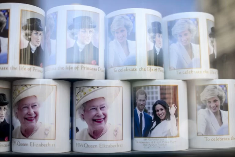 Souvenirs featuring Britain's Prince Harry and his fiance US actress Meghan Markle in a gift shop in Central London, on May 17, 2018. St George's Chapel at Windsor Castle will host the wedding of Prince Harry and Meghan Markle. The town, which gives its name to the Royal Family, is ready for the events as the shops started to sell the official merchandise of the pair. (Photo by Alberto Pezzali/NurPhoto)
