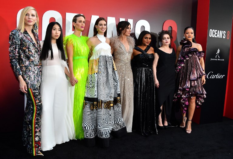 Australian actress Cate Blanchett (L), rapper/actress Awkwafina (2nd from L), actress Sarah Paulson (3rd from L), actress Anne Hathaway (4th from L), actress Sandra Bullock (4th from R), actress Mindy Kaling (3rd from R), British actress Helena Bonham Carter (2nd from R) and singer/actress Rihanna (R) attend the World Premiere of OCEANS 8 June 5, 2018 in New York.                              OCEANS 8 will be released nationwide on June 8, 2018.  / AFP PHOTO / Angela WEISS