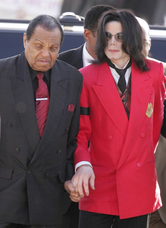 (FILES) In this file photo taken on March 13, 2005 Michael Jackson (R) arrives with his father, Joe Jackson, at the Santa Barbara County Courthouse for Michael's child molestation trial in Santa Maria, California. Joe Jackson, the father of Michael Jackson who created the Jackson 5 music family with iron will, died June 27, 2018, reports said. He was 89. Entertainment sites TMZ and ET said that Jackson died Wednesday after a battle with cancer. Representatives for family members did not immediately respond to requests for comment, but Jackson himself hinted at his impending death in a tweet two days ago. / AFP PHOTO / GETTY IMAGES NORTH AMERICA / CARLO ALLEGRI