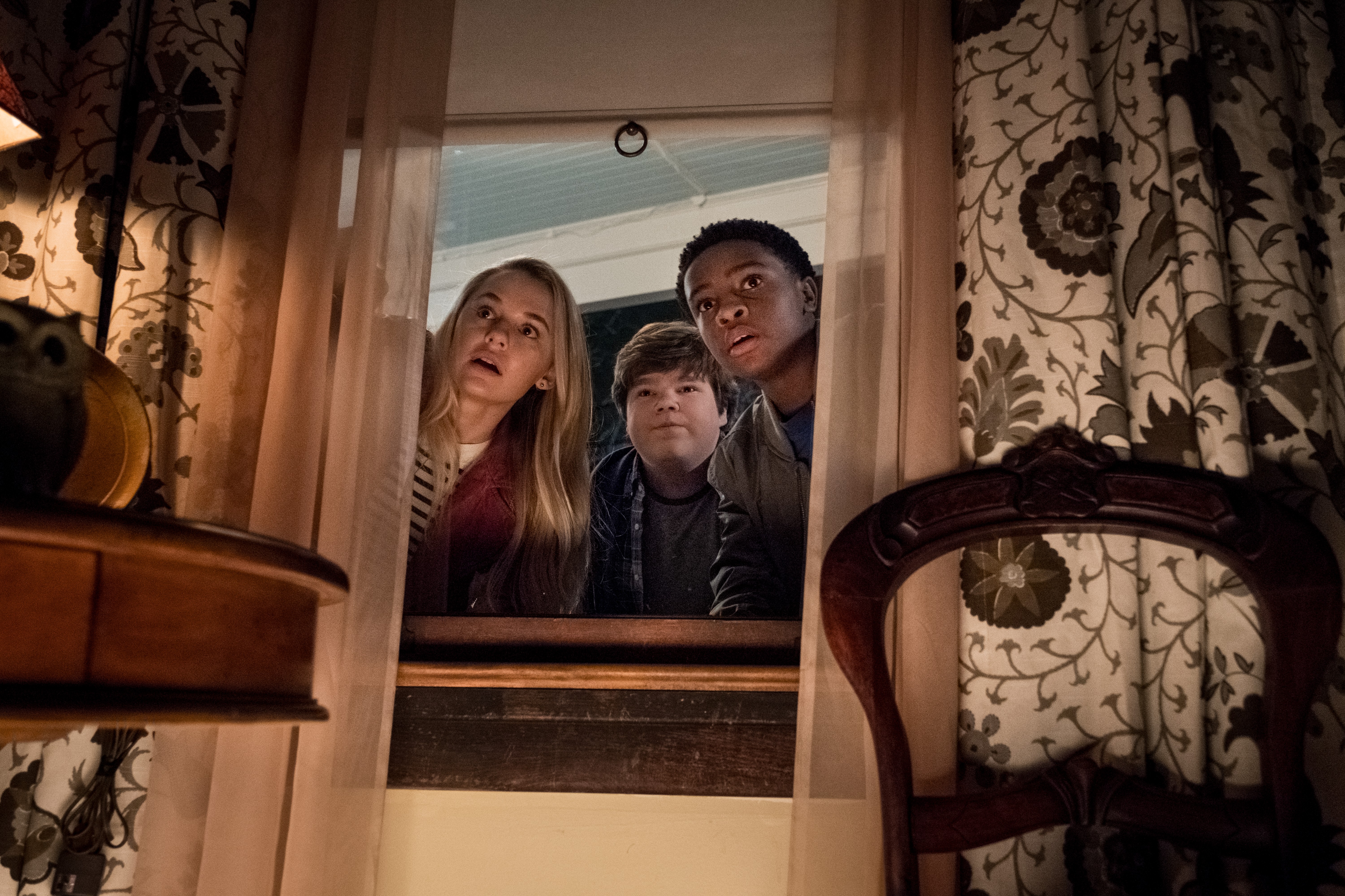 Madison Iseman (Sarah) Jeremy Ray Taylor (Sonny) Caleel Harris (Sam): EXT Tommy's House: The kids try to get into Tommy's house to find the book. Tommy's nana is asleep on the couch"
