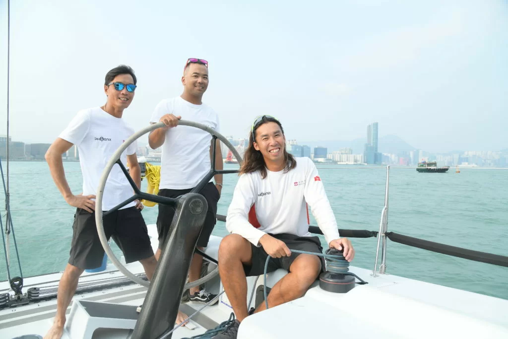 謝劭傑和隊友何偉健、呂金最愛揚帆出海的日子。