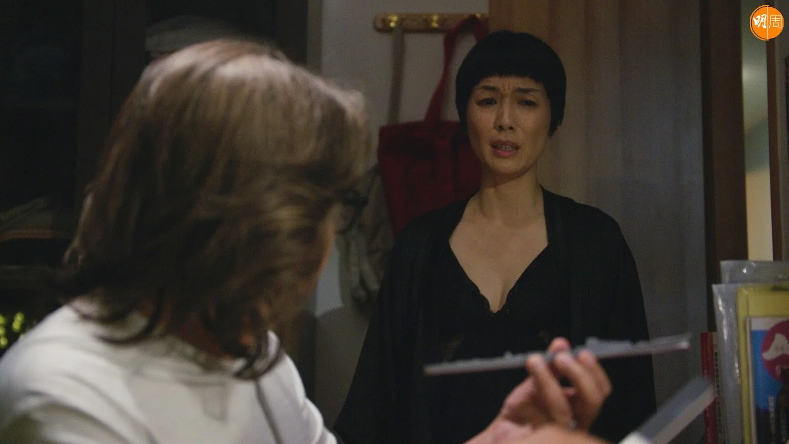 江美儀讚林敏驄認真工作。